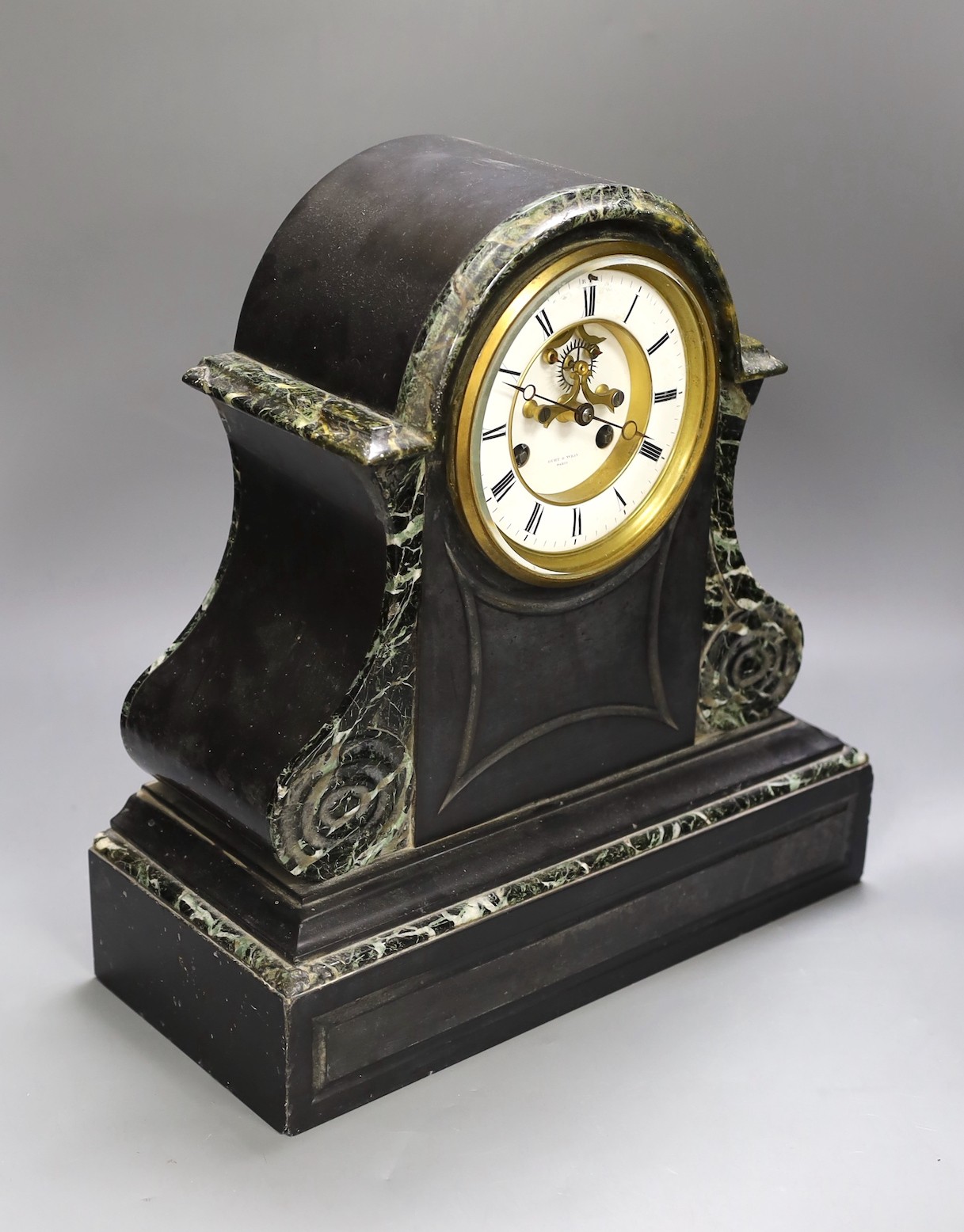 A late 19th century black slate and marble mantel clock, Hubt and Wray Paris, 36cms high